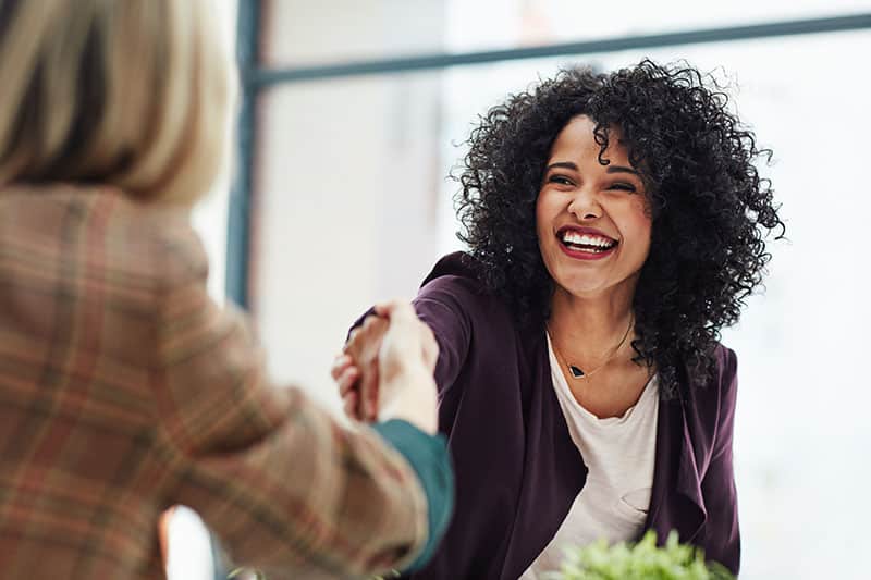 Handshake,With,A,Happy,,Confident,And,Excited,Business,Woman,Or